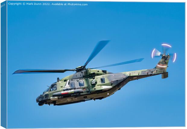 Military Helicopter in level flight Canvas Print by Mark Dunn