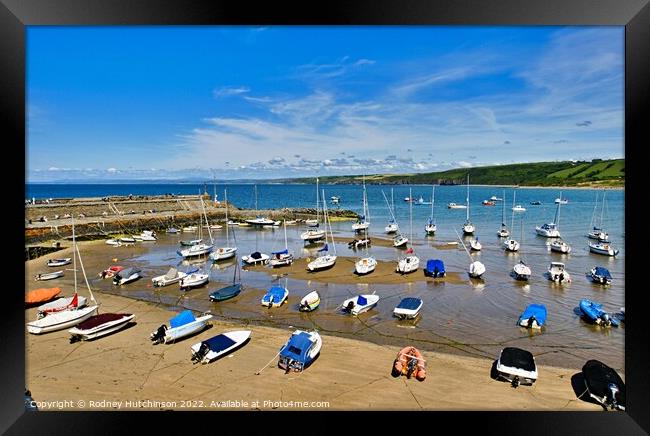 Serene Boats at Low Tide Framed Print by Rodney Hutchinson