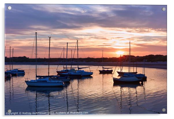 Serene Sunset Yachts Acrylic by Rodney Hutchinson