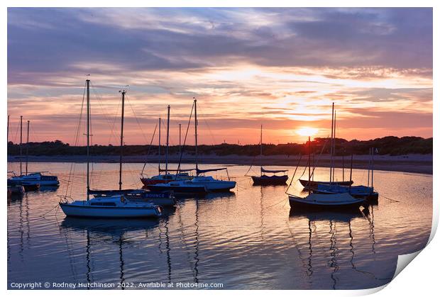 Serene Sunset Yachts Print by Rodney Hutchinson