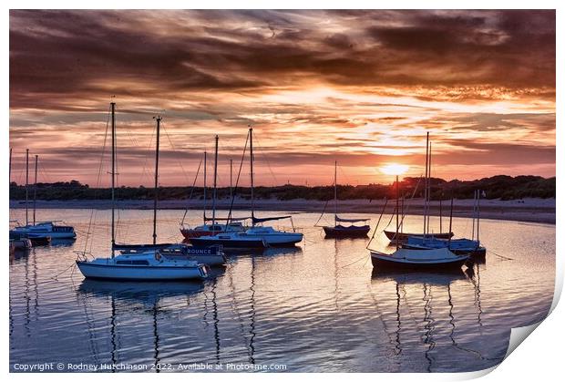 Serene Sunset over Beadnell Bay Print by Rodney Hutchinson
