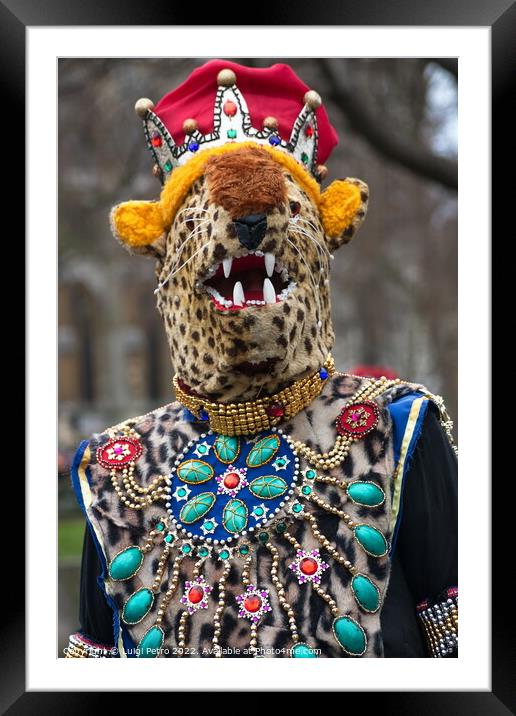 Masked participant in the New Year Parade in London, UK. Framed Mounted Print by Luigi Petro
