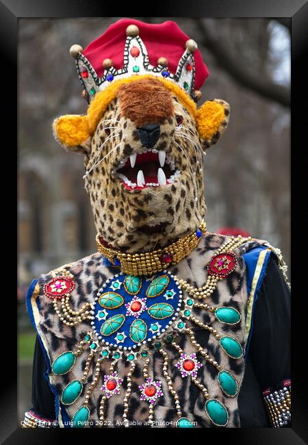 Masked participant in the New Year Parade in London, UK. Framed Print by Luigi Petro