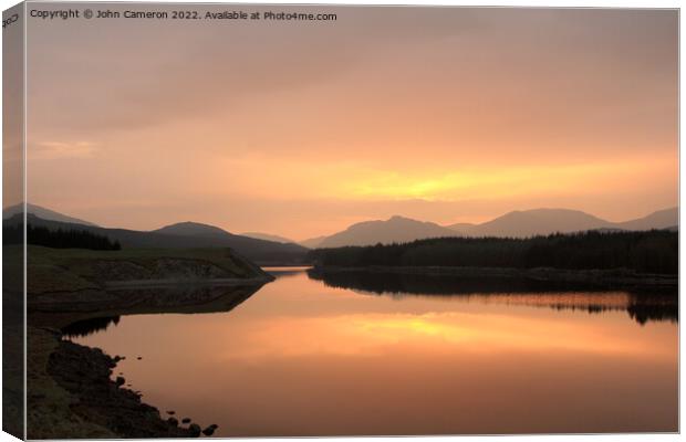 Sunrise at Laggan Dam in the Scottish Highlands. Canvas Print by John Cameron