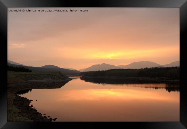 Sunrise at Laggan Dam in the Scottish Highlands. Framed Print by John Cameron