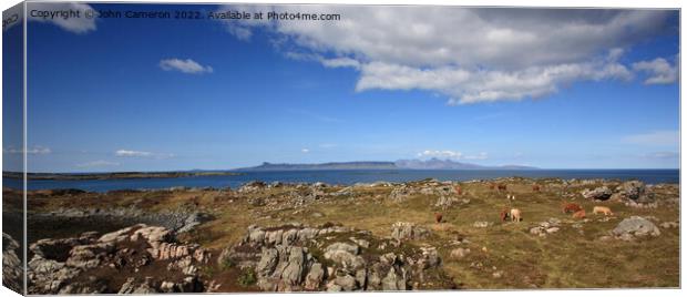 Isles of Rum and Eigg from Rhu in Arisaig. Canvas Print by John Cameron