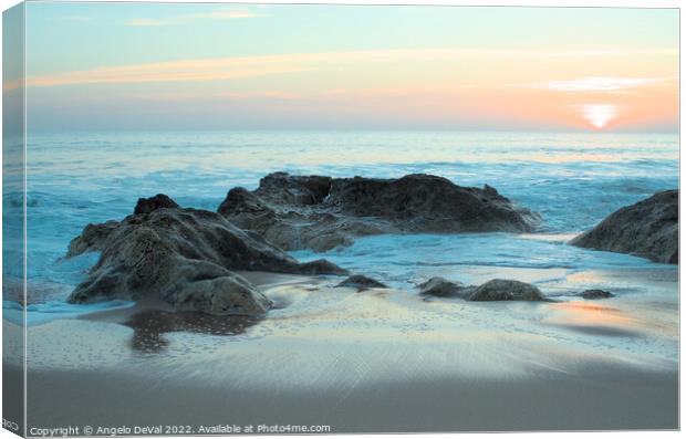 Waves, rocks and sunset in Salgados Canvas Print by Angelo DeVal