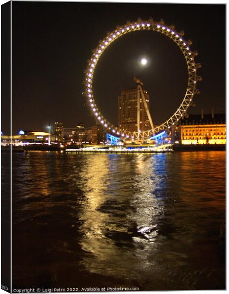 Night shot of the London Eye, London, UK. Canvas Print by Luigi Petro