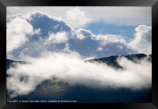 Rolling clouds Framed Print by Simon Connellan