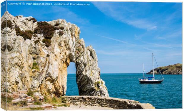 Rock Arch in the Bay Anglesey Coast Wales Canvas Print by Pearl Bucknall