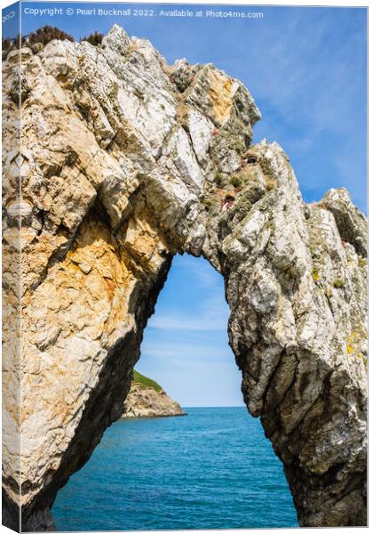 Natural Rock Arch on Anglesey Coast Canvas Print by Pearl Bucknall