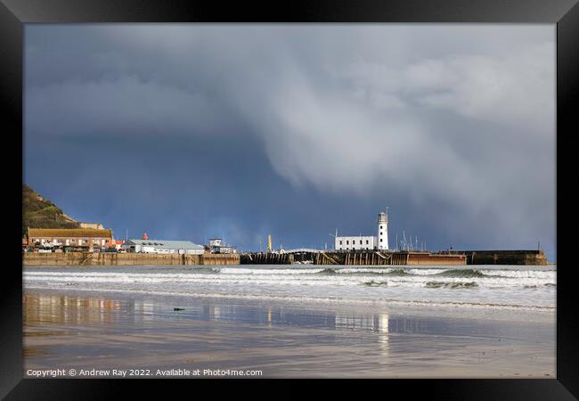 Storm clouds over Scarborough Lighthouse Framed Print by Andrew Ray