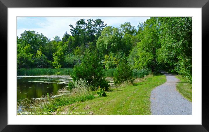 Serene Path Alongside Jackson Park Pond Framed Mounted Print by Ken Oliver