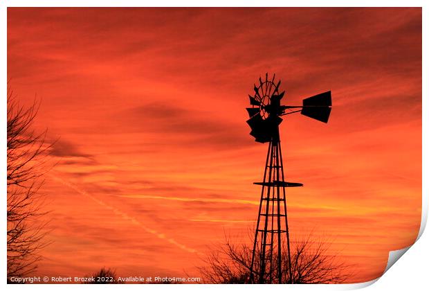 Kansas Sunset with red sky and a Windmill silhouet Print by Robert Brozek