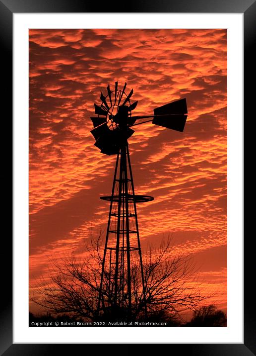 Kansas Sunset with a colorful Sky with a Windmill  Framed Mounted Print by Robert Brozek