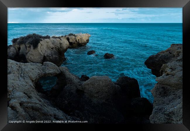 Rocks and Sea Near Aveiros Beach Framed Print by Angelo DeVal