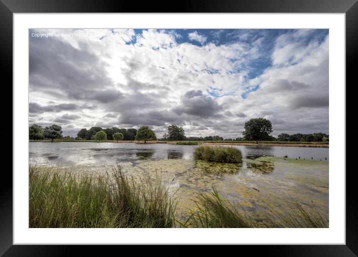 Morning clouds over Heron pond Bushy Park Framed Mounted Print by Kevin White