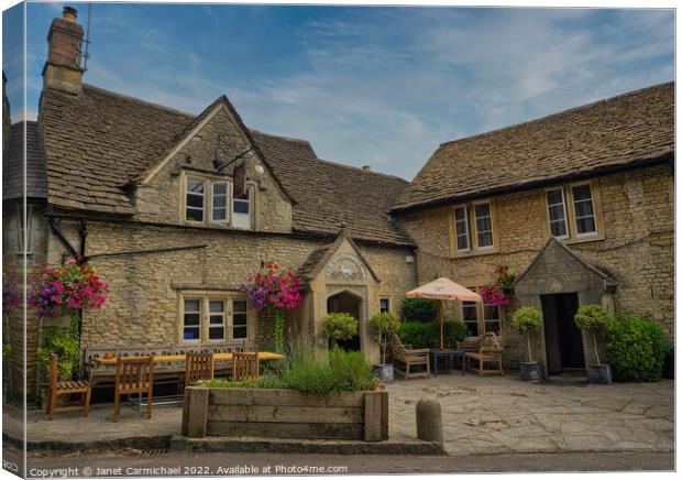 Charming White Hart Inn in the Cotswolds Canvas Print by Janet Carmichael