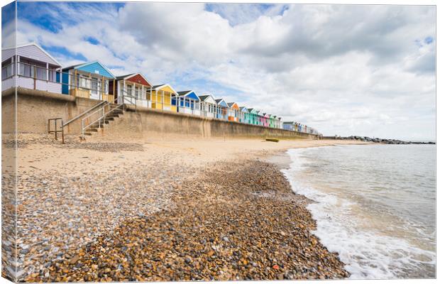 Southwold beach huts next to the pier Canvas Print by Jason Wells