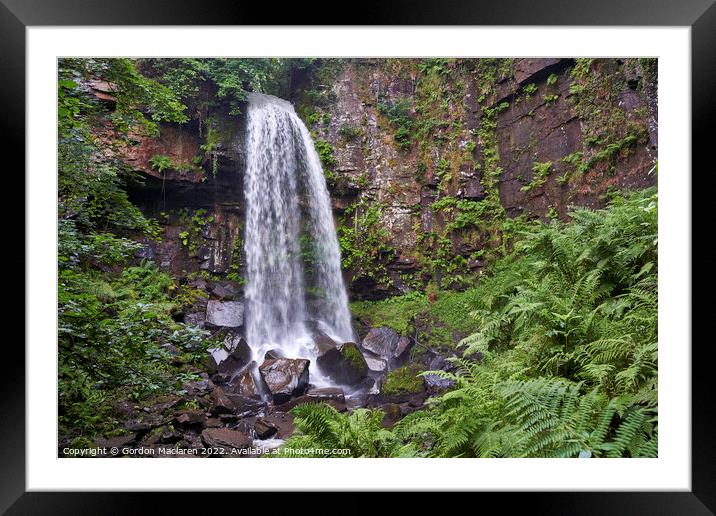 A large waterfall in a forest Framed Mounted Print by Gordon Maclaren