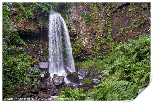 A large waterfall in a forest Print by Gordon Maclaren