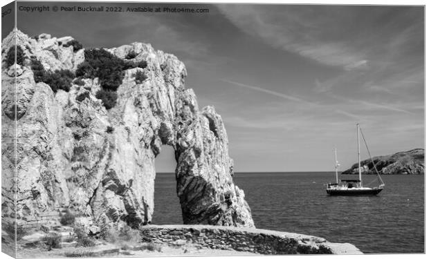 Rock Arch in the Bay Anglesey Coast Black and Whit Canvas Print by Pearl Bucknall