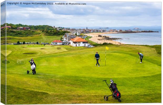 Golfers on green at Glen Golf Course North Berwick Canvas Print by Angus McComiskey