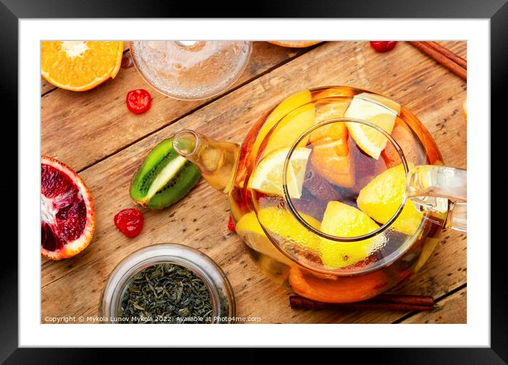 Fruit tea with citrus, tea kettle Framed Mounted Print by Mykola Lunov Mykola