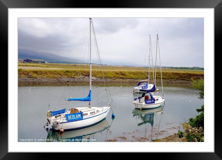 Yacht reflections at Shell Island Wales. Framed Mounted Print by john hill