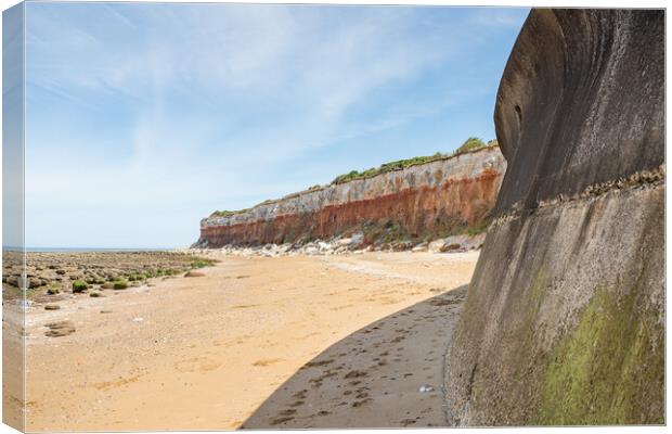 Sea wall at Hunstanton meets the cliffs Canvas Print by Jason Wells