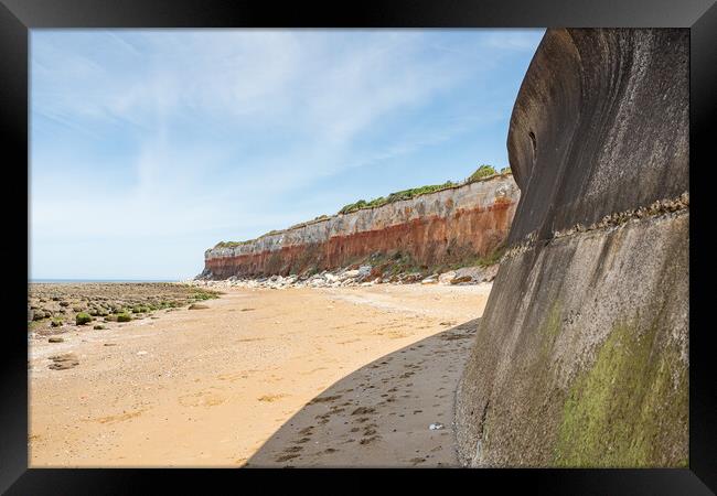 Sea wall at Hunstanton meets the cliffs Framed Print by Jason Wells