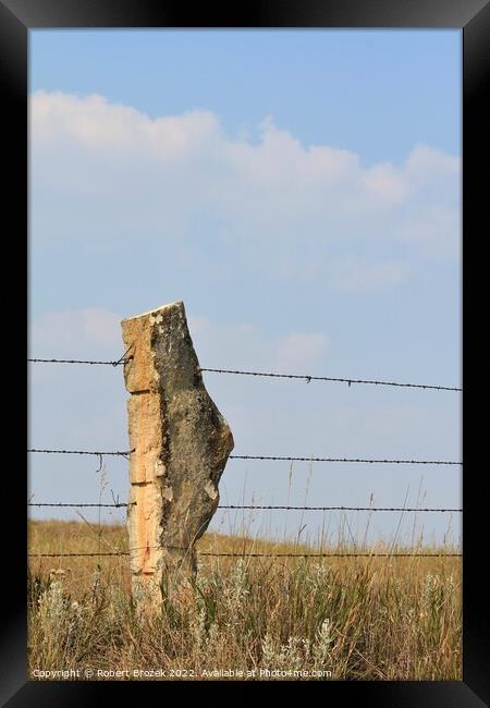 Stone Post fence with a field and blue sky Framed Print by Robert Brozek