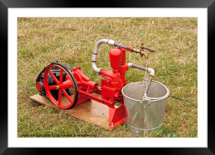 Ancient Water Pump Framed Mounted Print by Sally Wallis