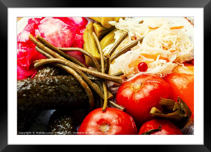 Pickled vegetables and sauerkraut, close up Framed Mounted Print by Mykola Lunov Mykola