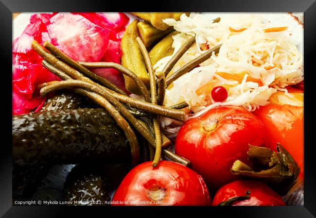 Pickled vegetables and sauerkraut, close up Framed Print by Mykola Lunov Mykola
