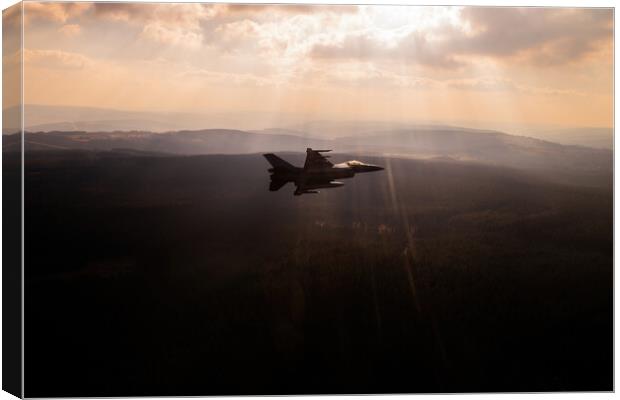 A fighter jet F-16 breaking away in a special light Canvas Print by Bart Rosselle