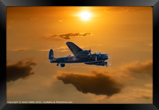 Lncaster bomber in flight at sunset Framed Print by Kevin Hellon