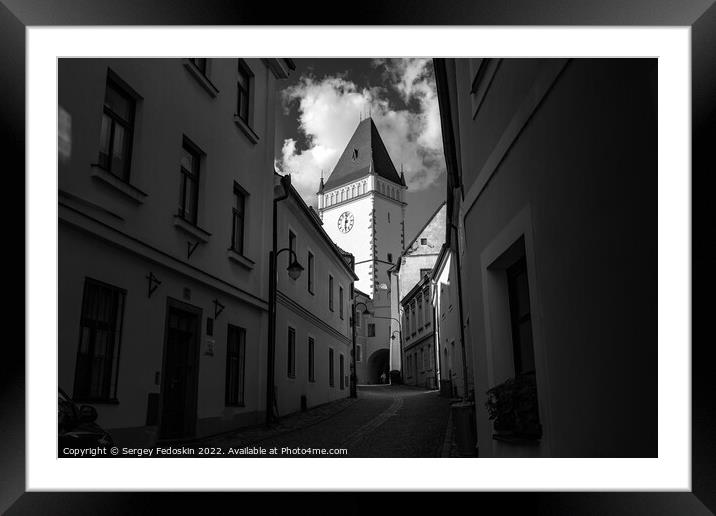 Medieval street with historical buildings, gothic clock tower of Town hall. Tabor, South Bohemia, Czech Republic. Framed Mounted Print by Sergey Fedoskin