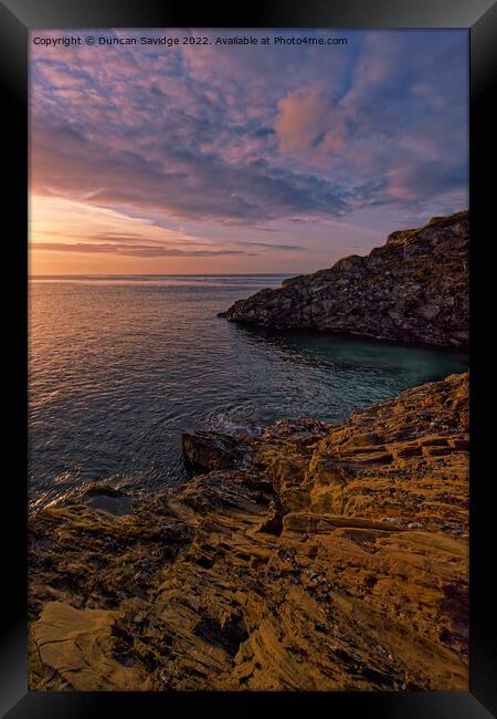 Sunrise on the rocks at Maenporth, South Cornwall Framed Print by Duncan Savidge