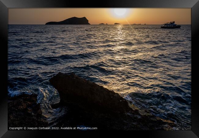Beautiful and warm sunset in the Mediterranean Sea from the coas Framed Print by Joaquin Corbalan