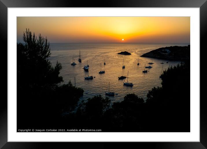  Several pleasure boats anchored in a cove on the island of Ibiz Framed Mounted Print by Joaquin Corbalan