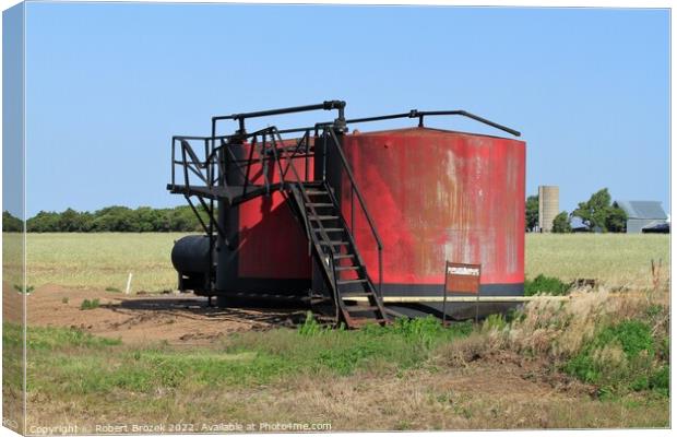  Red Oil Tank in a field with sky Canvas Print by Robert Brozek