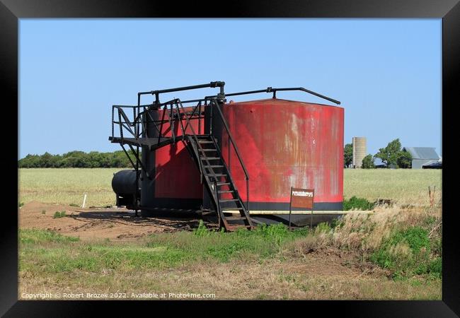  Red Oil Tank in a field with sky Framed Print by Robert Brozek