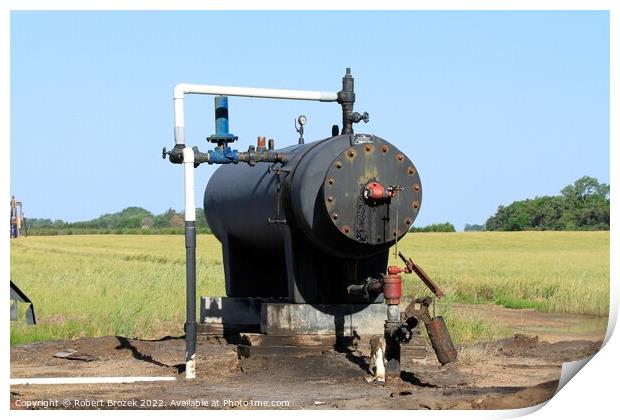 Oil Well Storage Equipment in a field Print by Robert Brozek