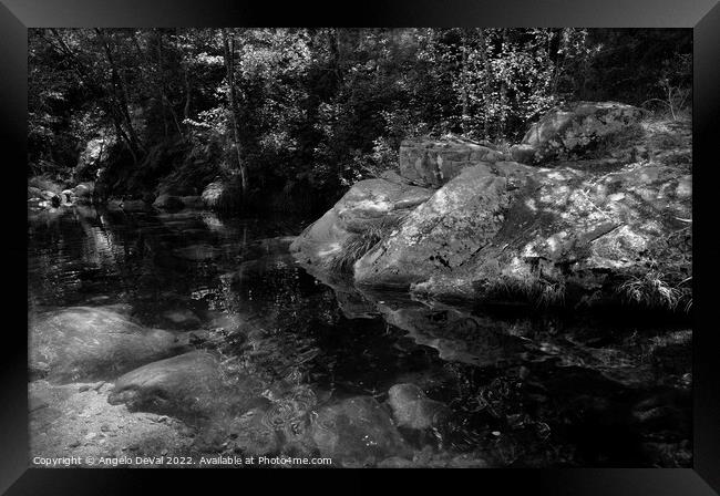 Rocks and peaceful river in Carvalhais with monochrome Framed Print by Angelo DeVal