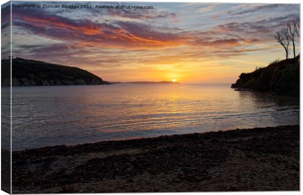 A sunrise from Maenporth beach Canvas Print by Duncan Savidge