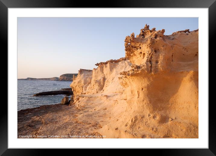 Limestone cliffs debris from erosion turns into white beach sand Framed Mounted Print by Joaquin Corbalan