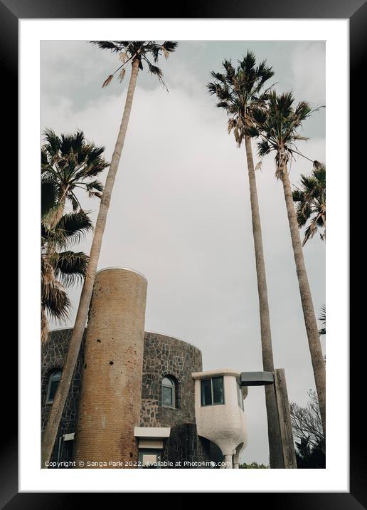Palm trees and vintage building Framed Mounted Print by Sanga Park