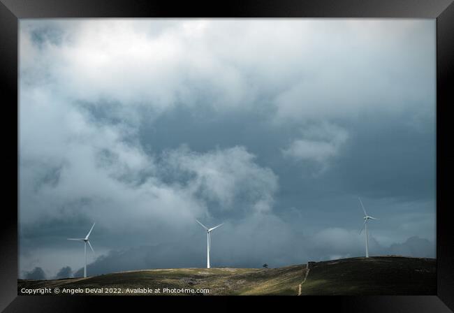 Wind turbines and clouds on Serra da Arada Framed Print by Angelo DeVal