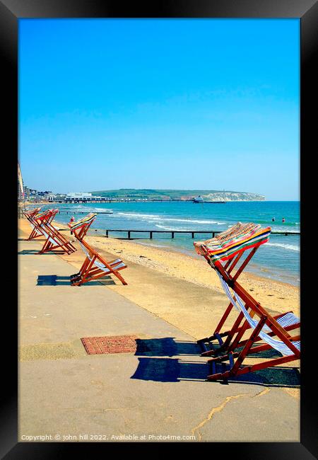 Early morning deckchairs at Sandown bay, Isle of Wight. Framed Print by john hill